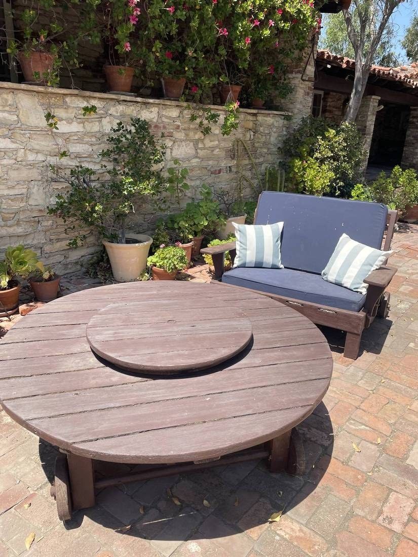 Outdoor patio furniture on a brick terrace