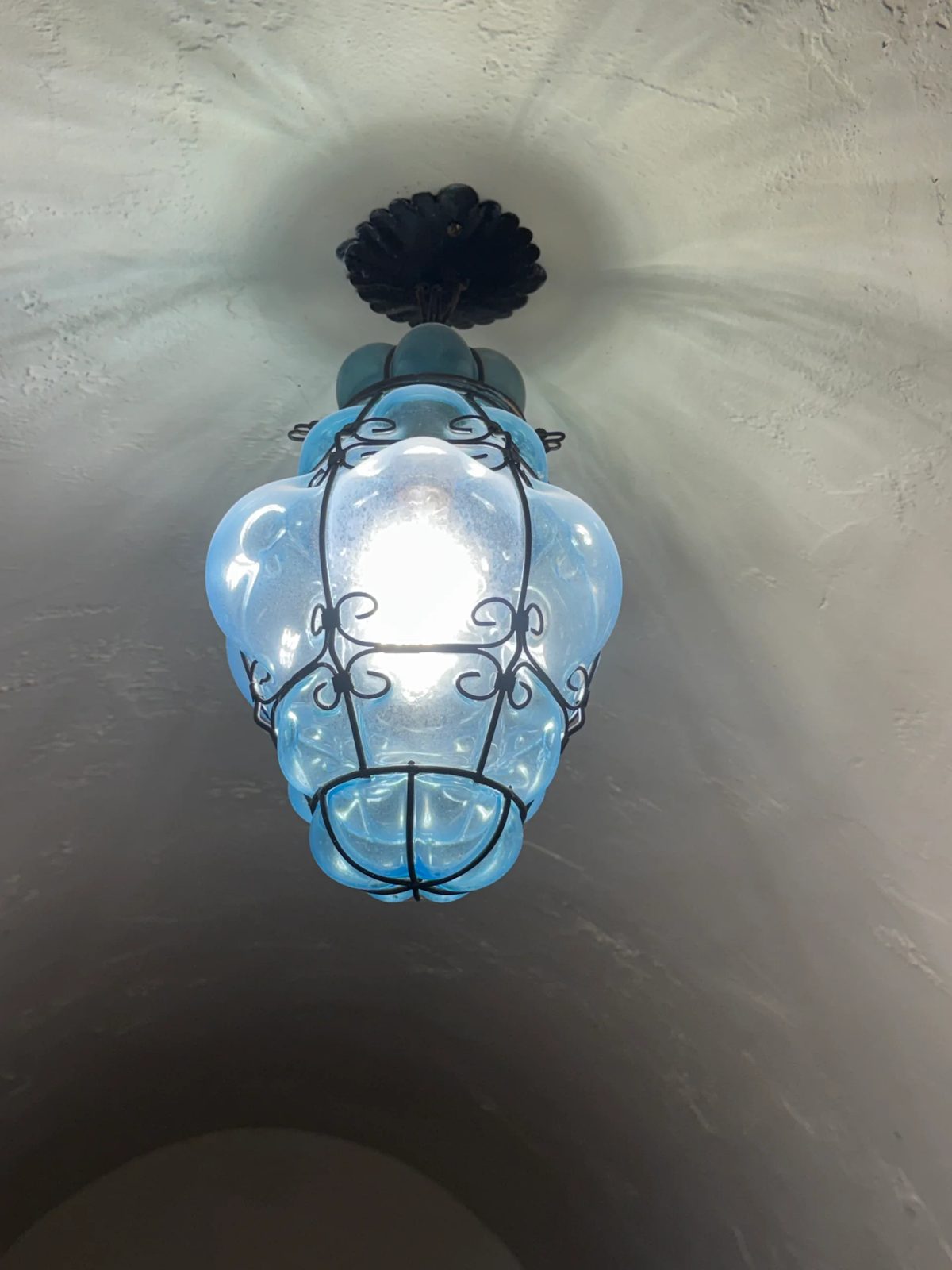 Blown glass lantern cataloged during the estate cleanout